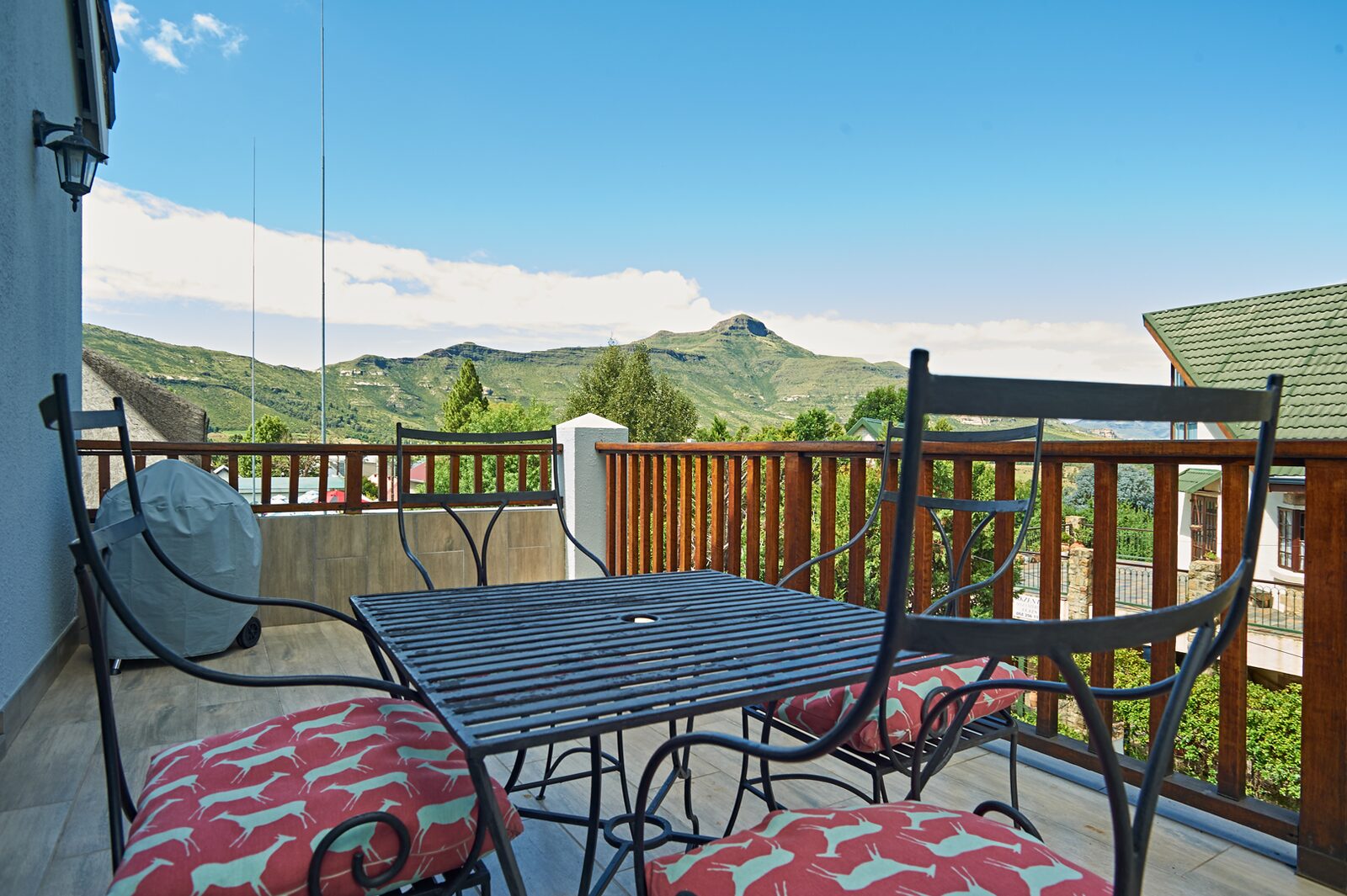 The Loft — Two bedrooms, two bathrooms, and the whole Maluti range off the patio.